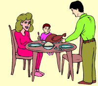 Family with turkey dinner